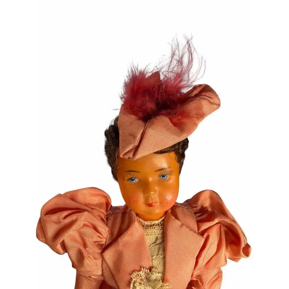 Doll The doll's attire, with its prominent 